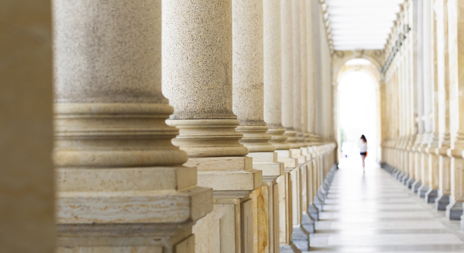 Row of classical columns, Mlynska colonnade Karlovy Vary Czech Republic established 1881, full frame horizontal composition, background with copy space