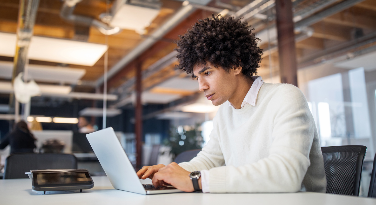 man working on laptop