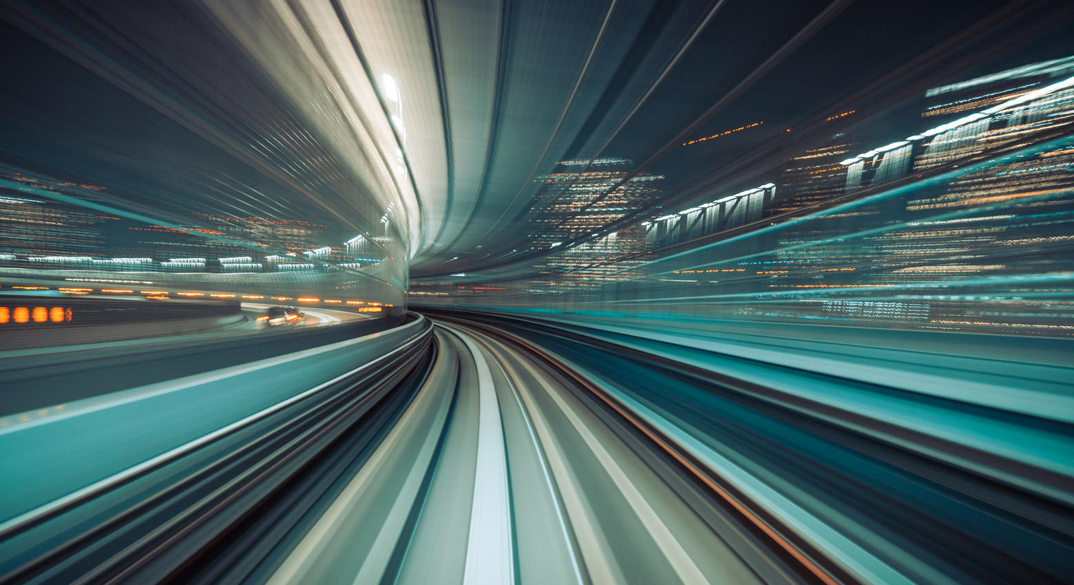 Long exposure Light trails of  train moving in tunnel,automated transit system controlled entirely by computers with no drivers on board,Transportation Technology,Futuristic Abstract background