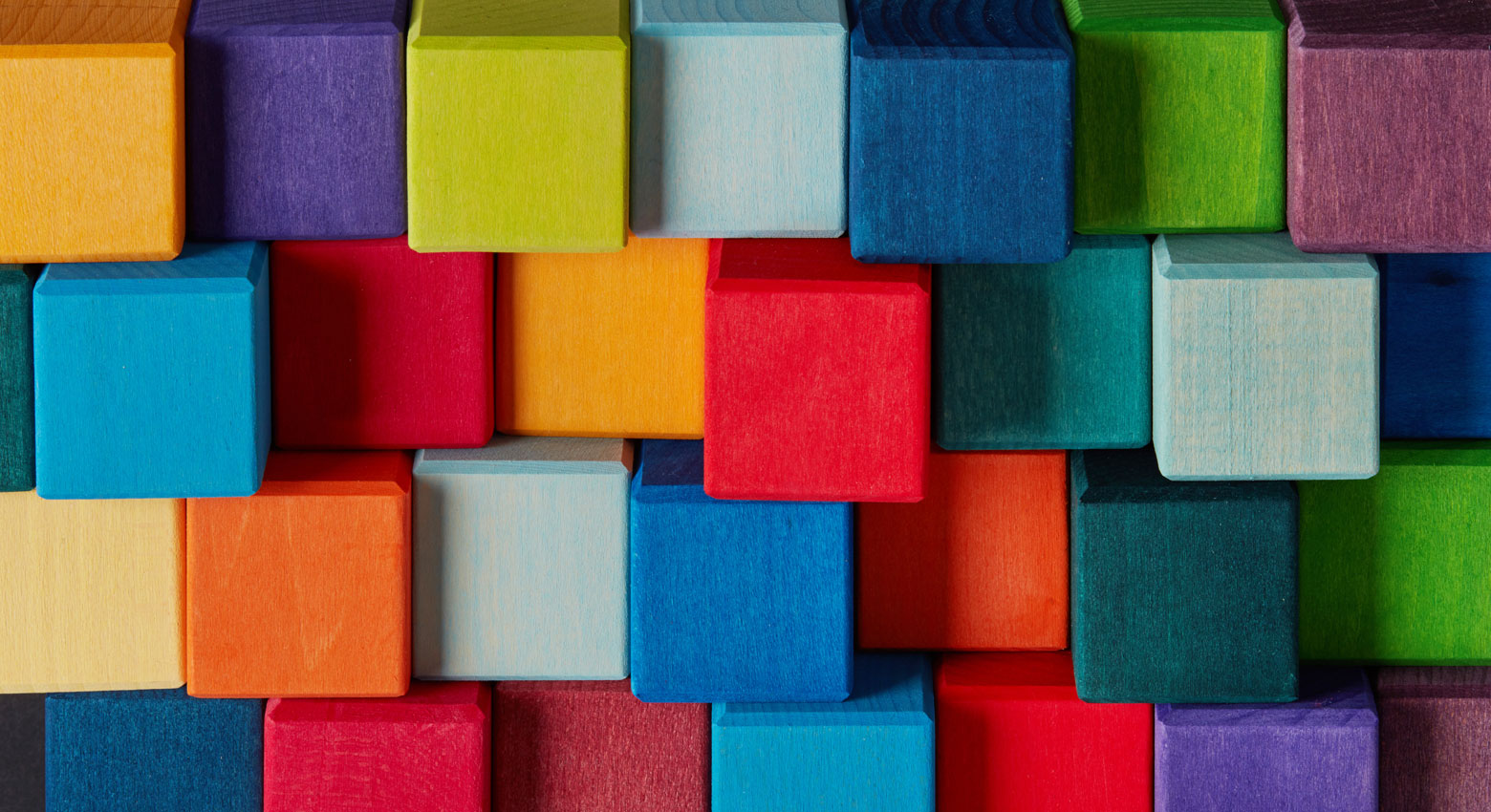 Multi-colored wooden toy blocks background