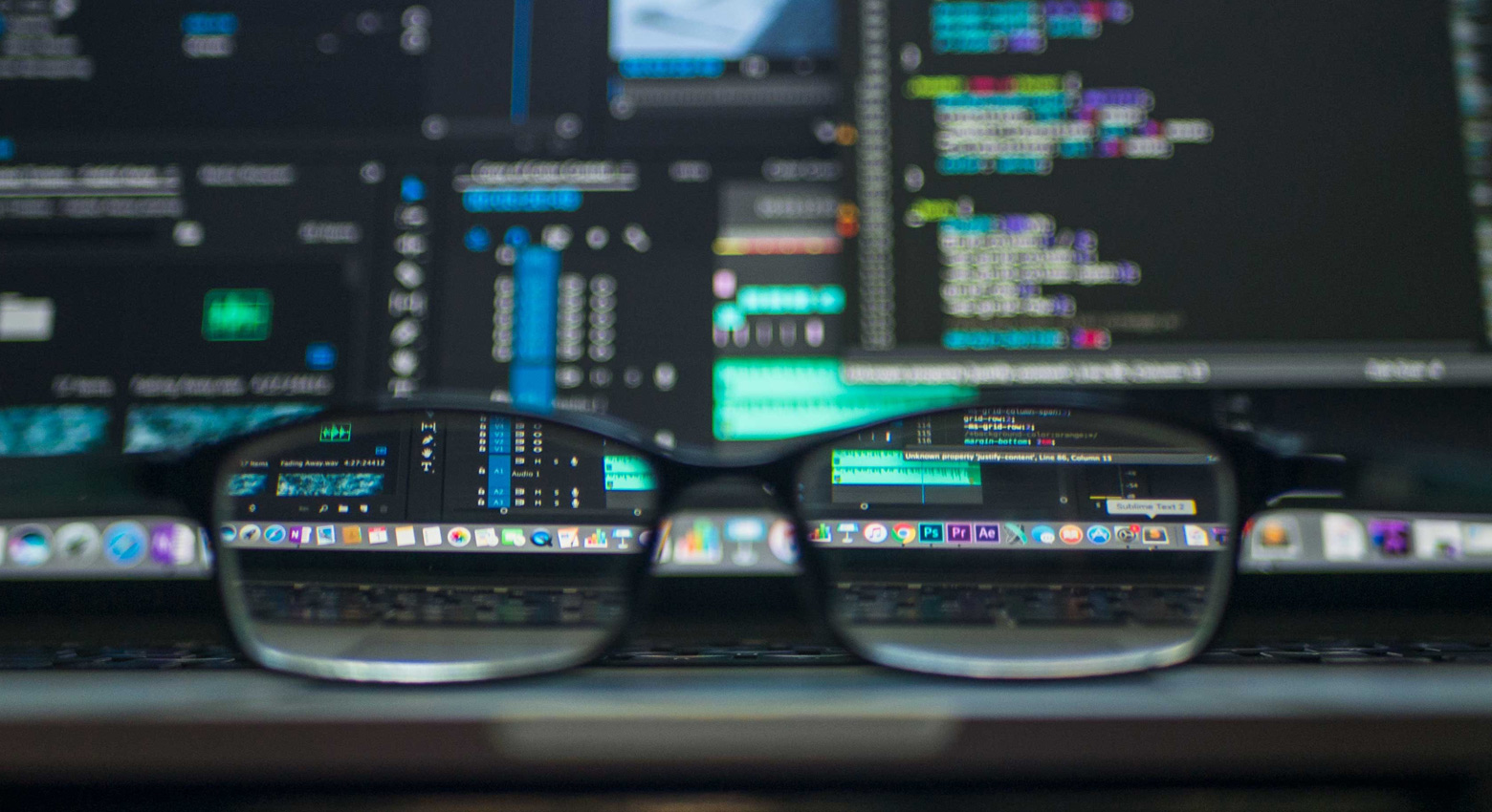 Glasses in front of computer screen 